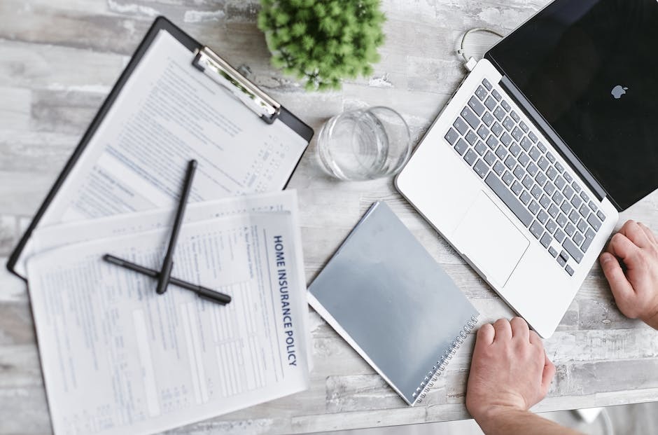 An Australian SME owner reviewing commercial insurance documents